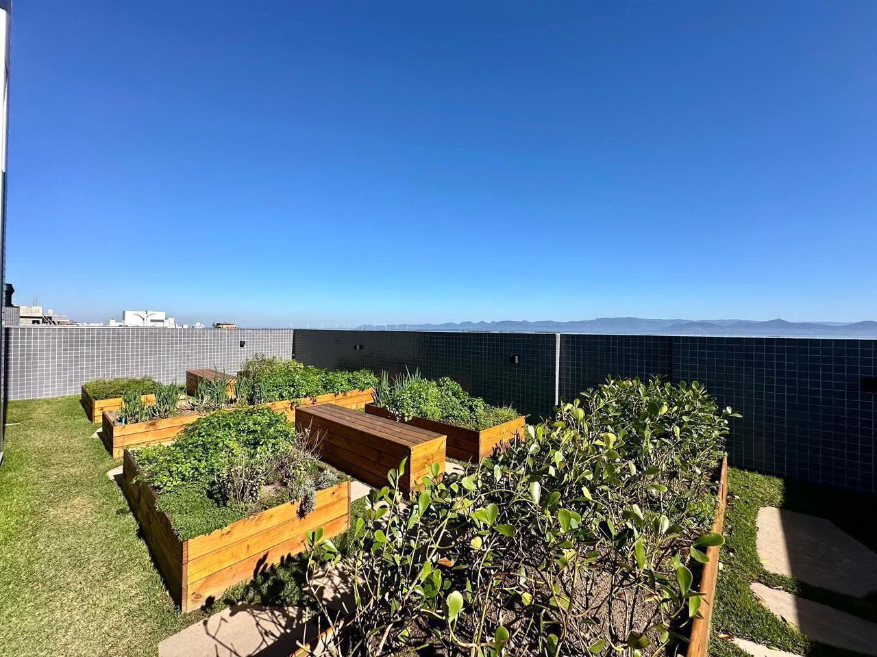 Horta compartilhada e telhado verde no rooftop